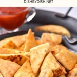 Air fried pita chips in a metal dish.