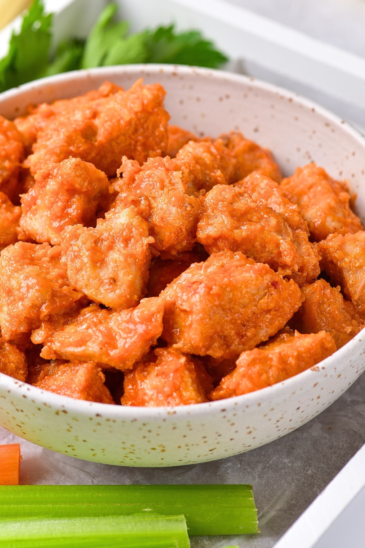 Up close shot of bowl of gluten-free buffalo chicken bites.