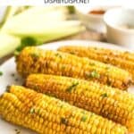 Air fryer corn on a white plate.