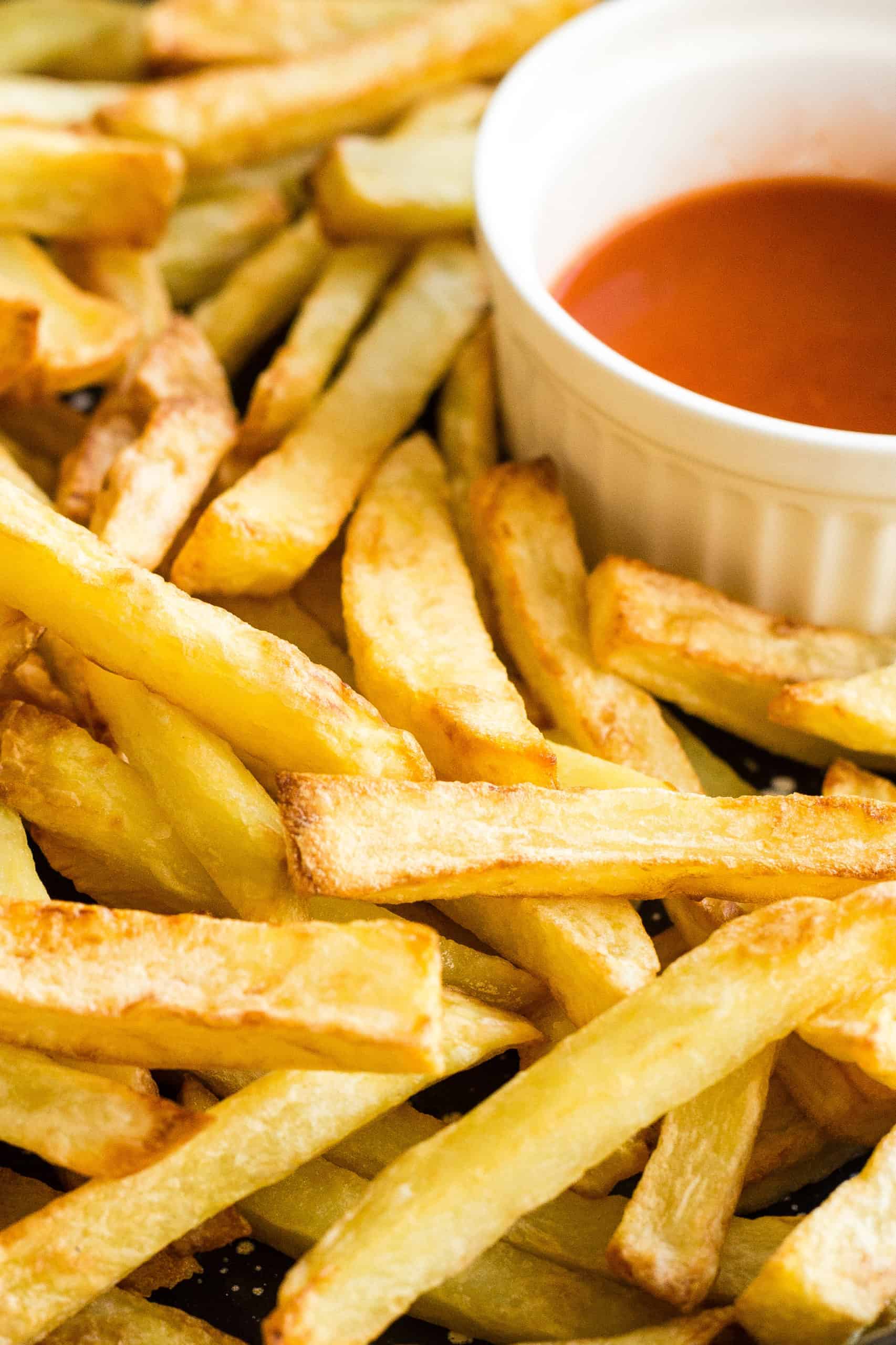 Closeup of freshly cooked air fryer french fries.