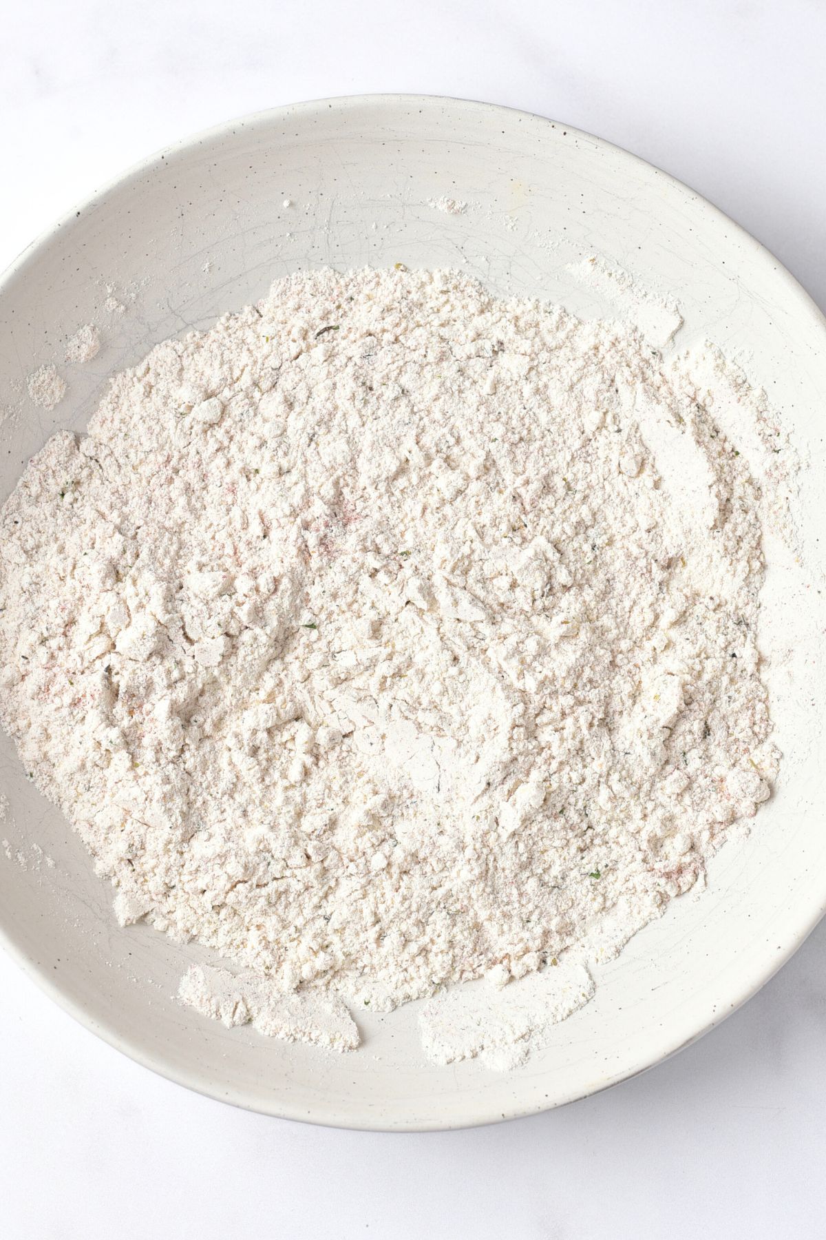 A bowl with flour mixture.