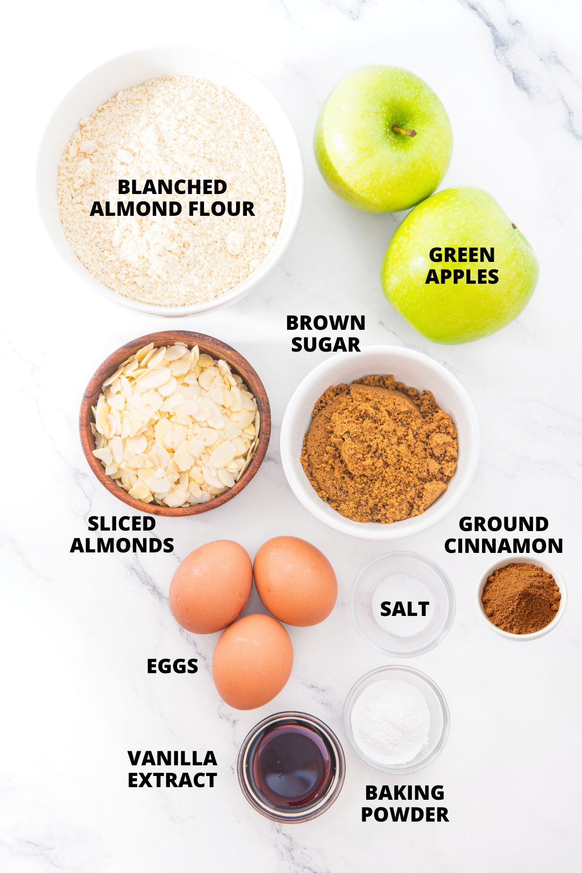 Almond Flour Apple Cake Recipe (Gluten-Free, Dairy-Free) Top down view of ingredients for gluten-free apple cake with almond flour recipe