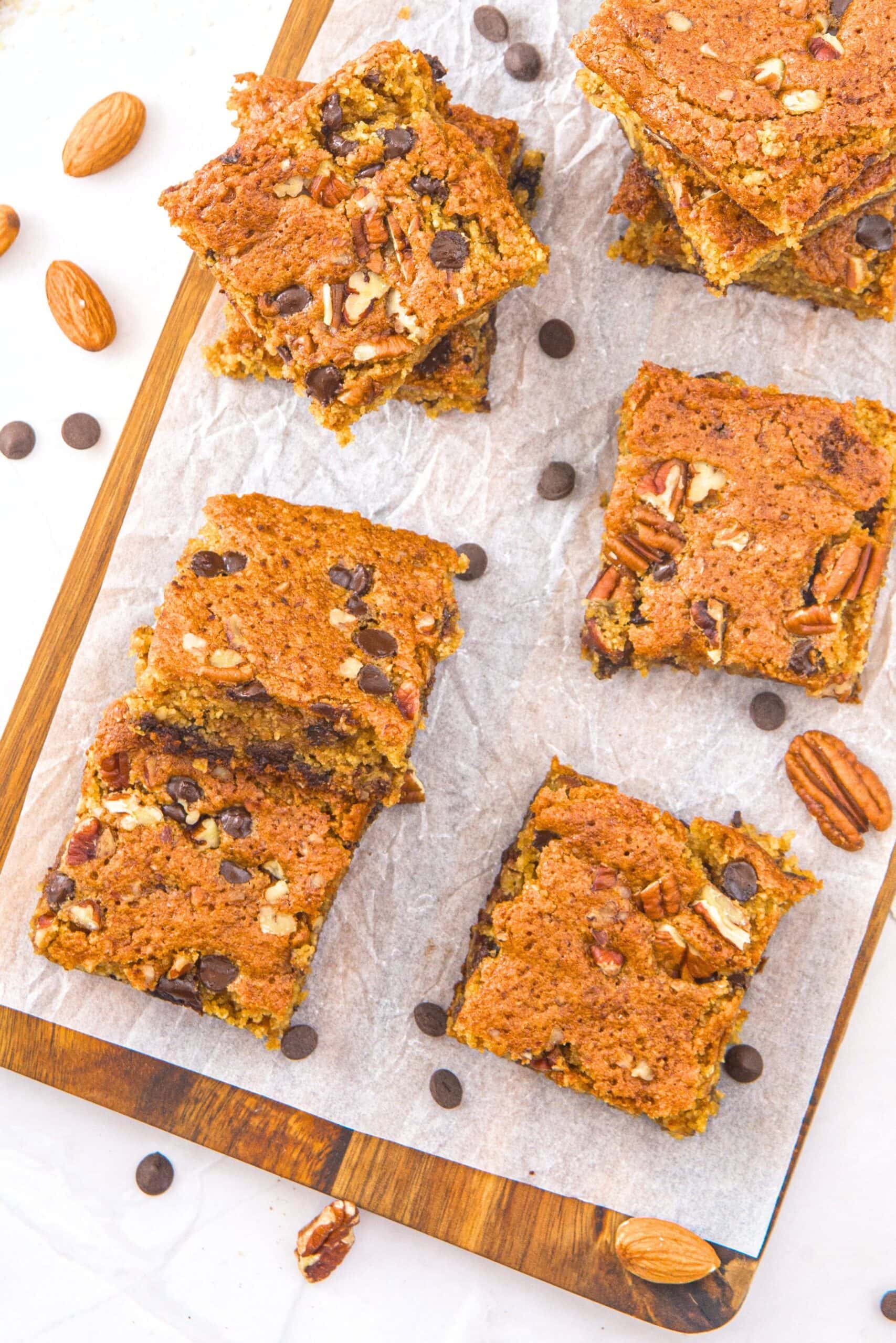 Top down view of gluten-free almond flour blondies on parchment paper.