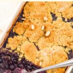 Up close view of half-eaten almond flour blueberry cobbler.