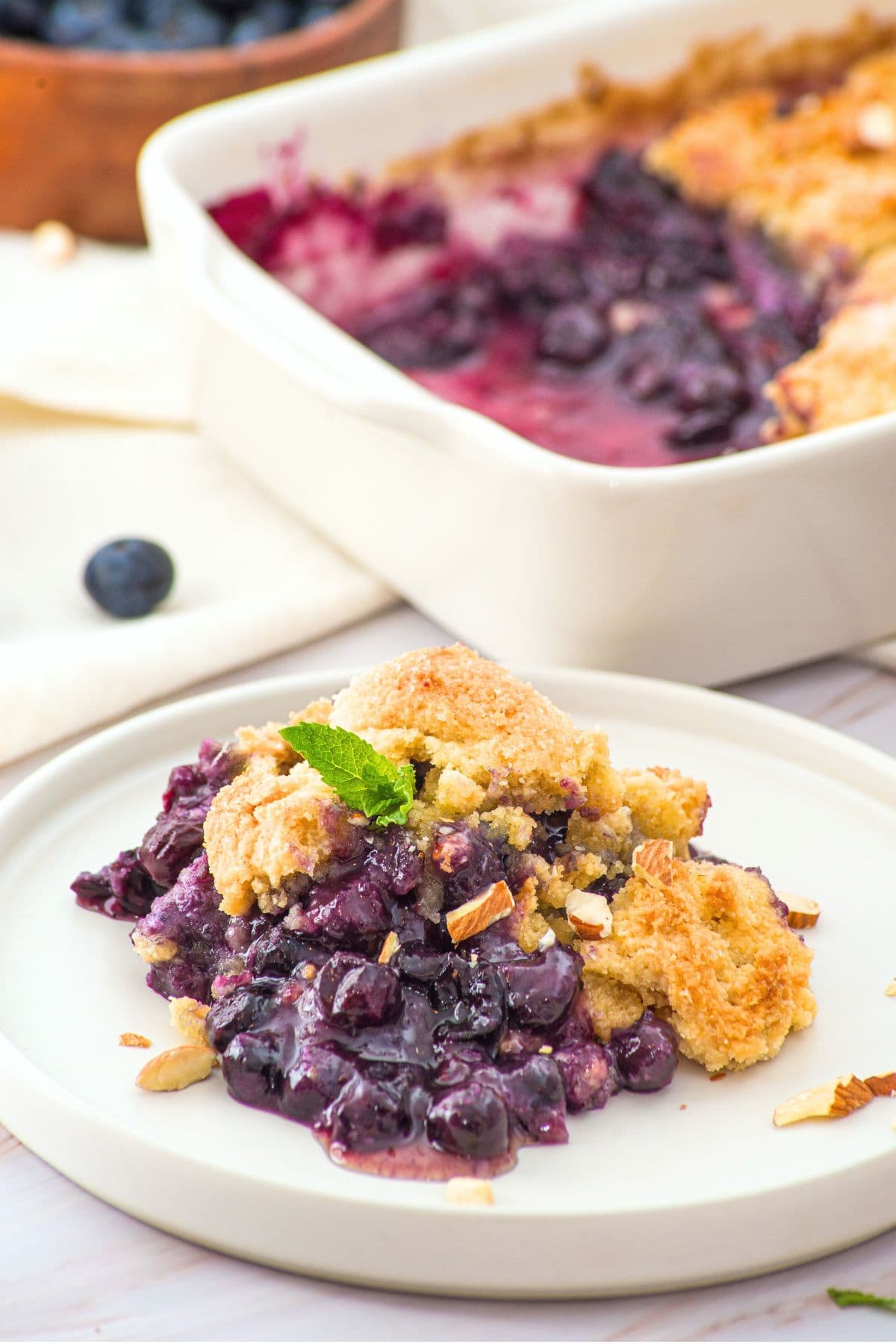A plate of gluten-free cobbler with almond flour.
