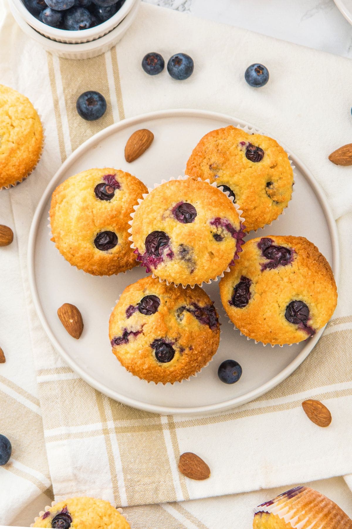 A plate of lemon blueberry almond flour muffins