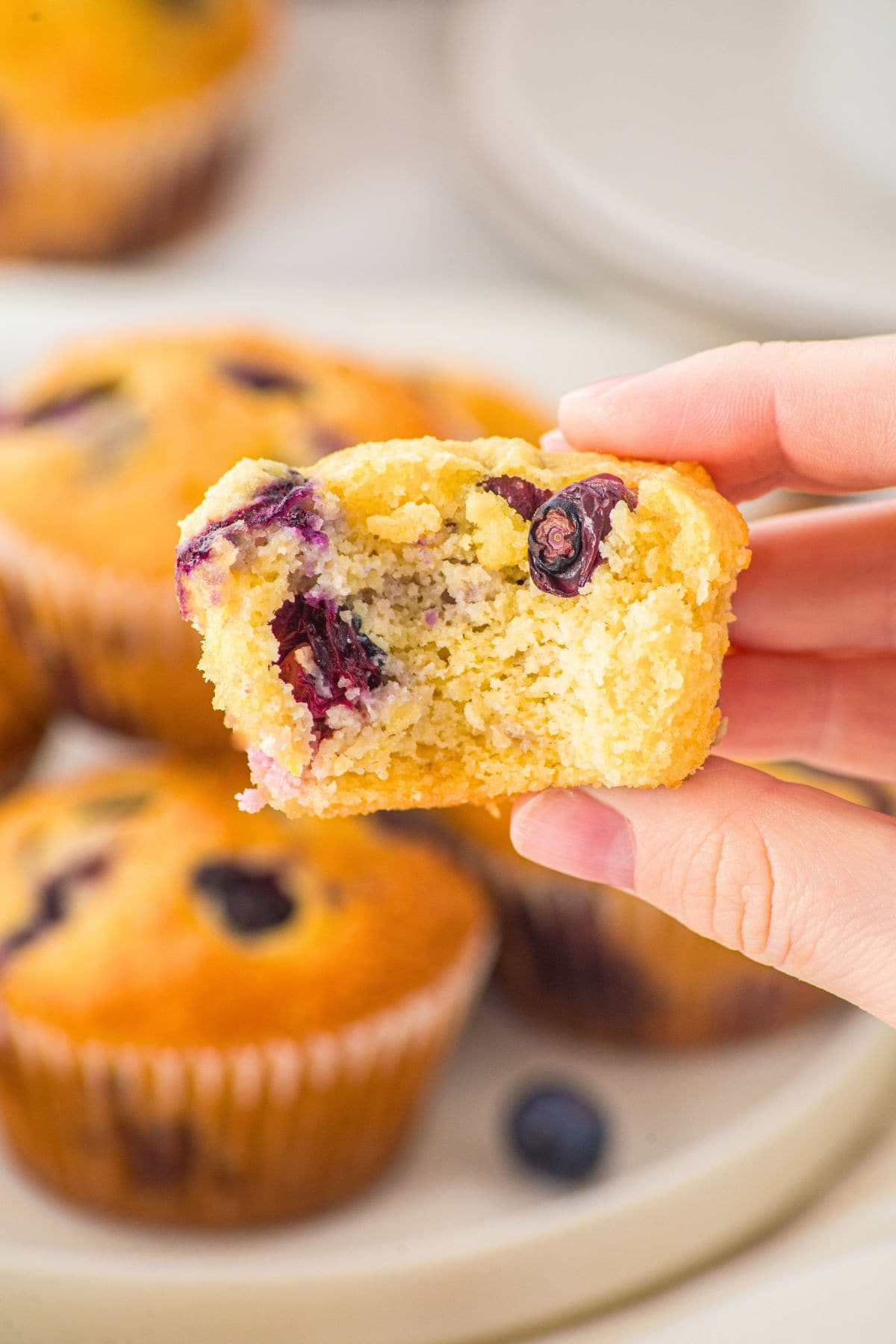 Holding up almond flour blueberry muffin