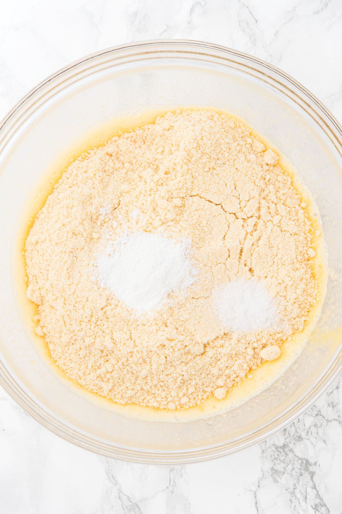 A bowl with almond flour, salt and baking powder