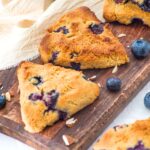 Almond flour blueberry scones on wooden board