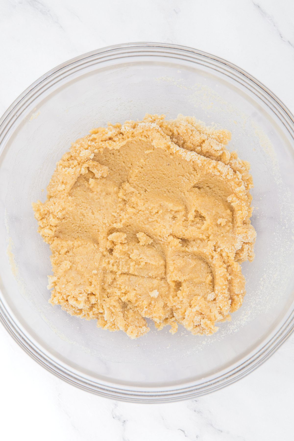 Almond flour scone dough in glass bowl