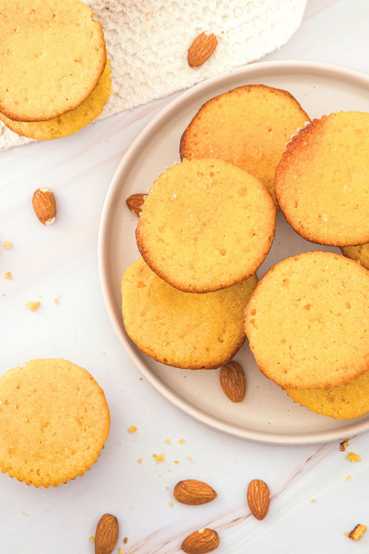 Top down view of almond flour cornbread muffins on plate