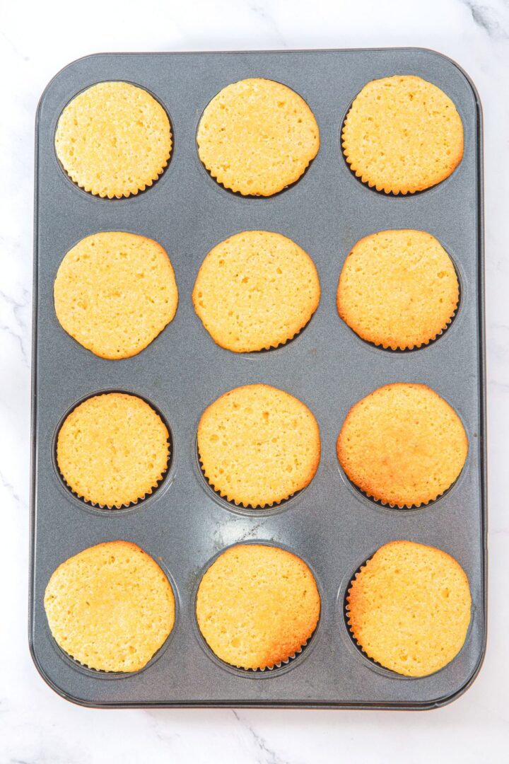 Freshly baked almond flour corn muffins in muffin pan