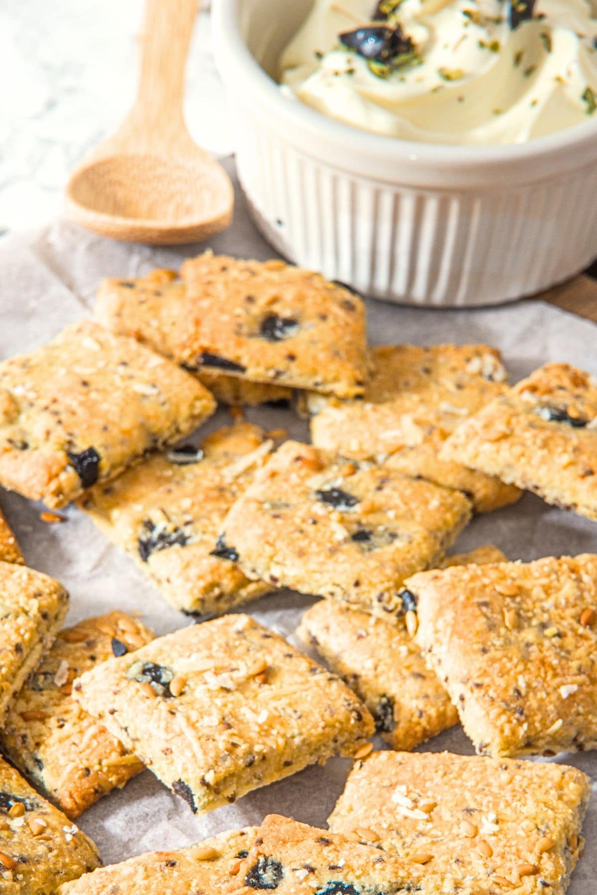 Up close view of almond flour cheese crackers on parchment