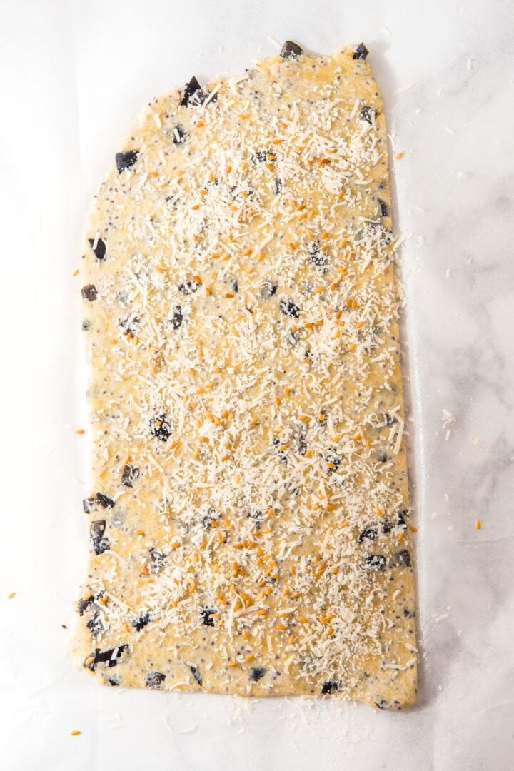 Cracker dough sprinkled with cheese