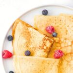 Top down view of gluten-free dairy-free almond flour crepes on plate