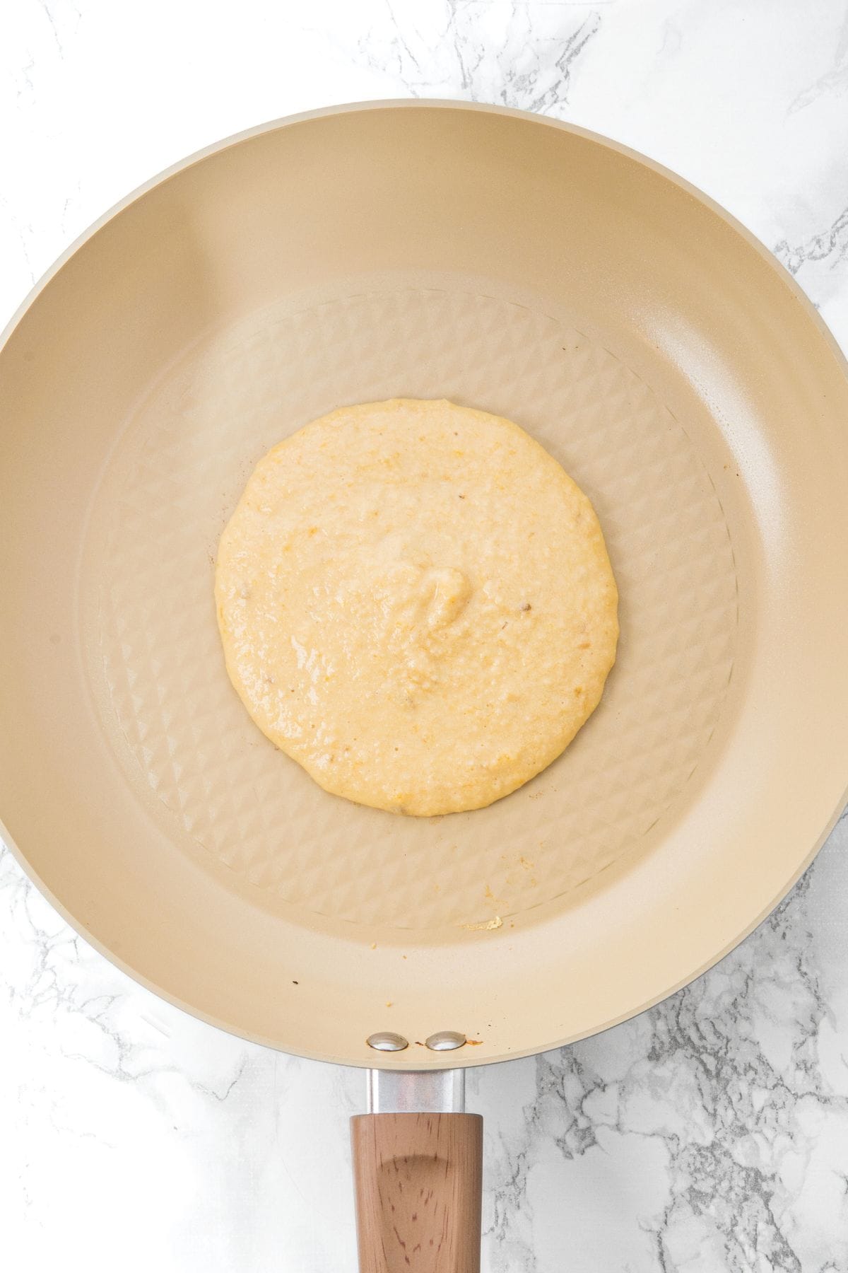 Cooking pancake batter in skillet