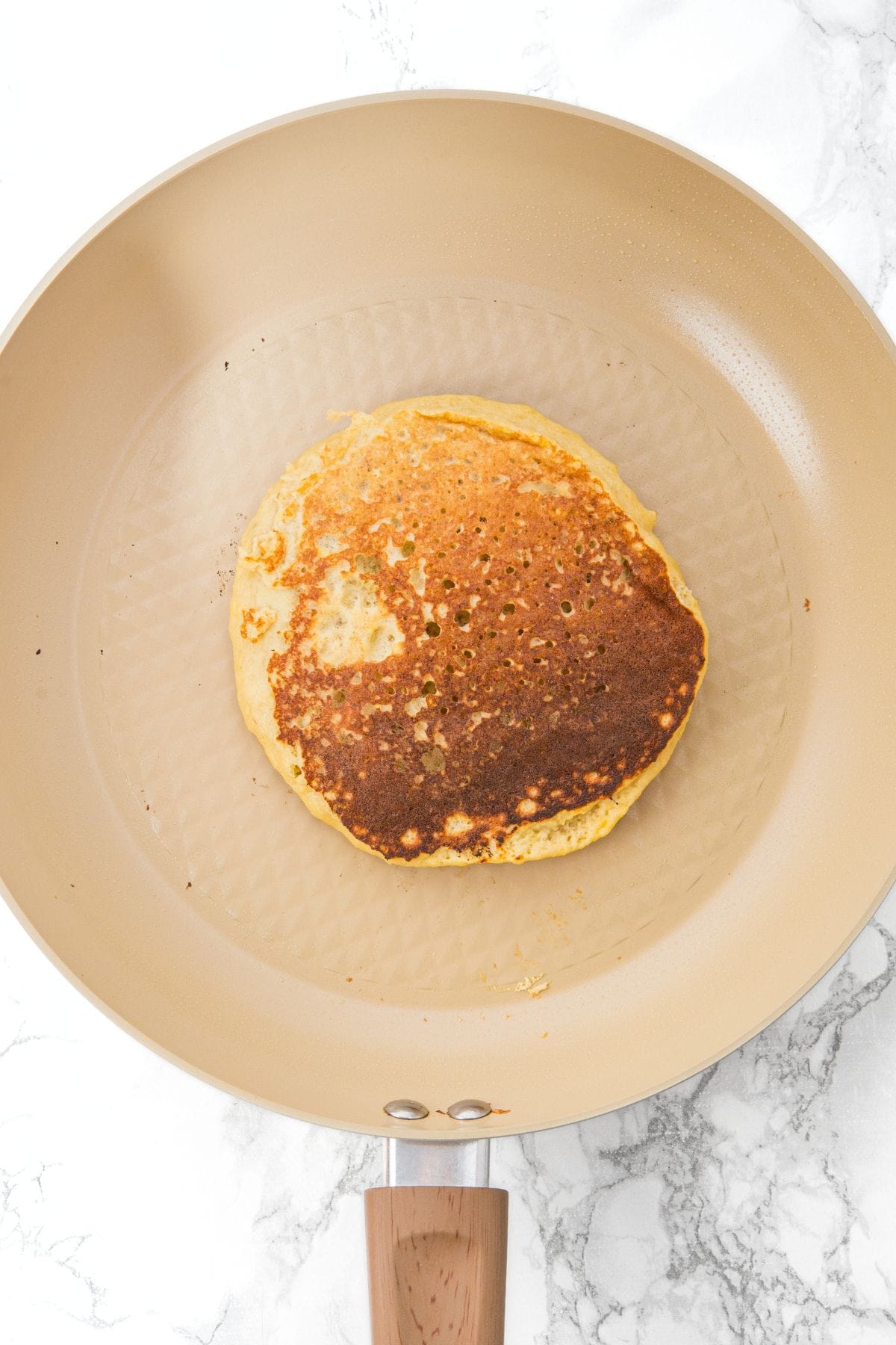 Freshly cooked pancake in skillet