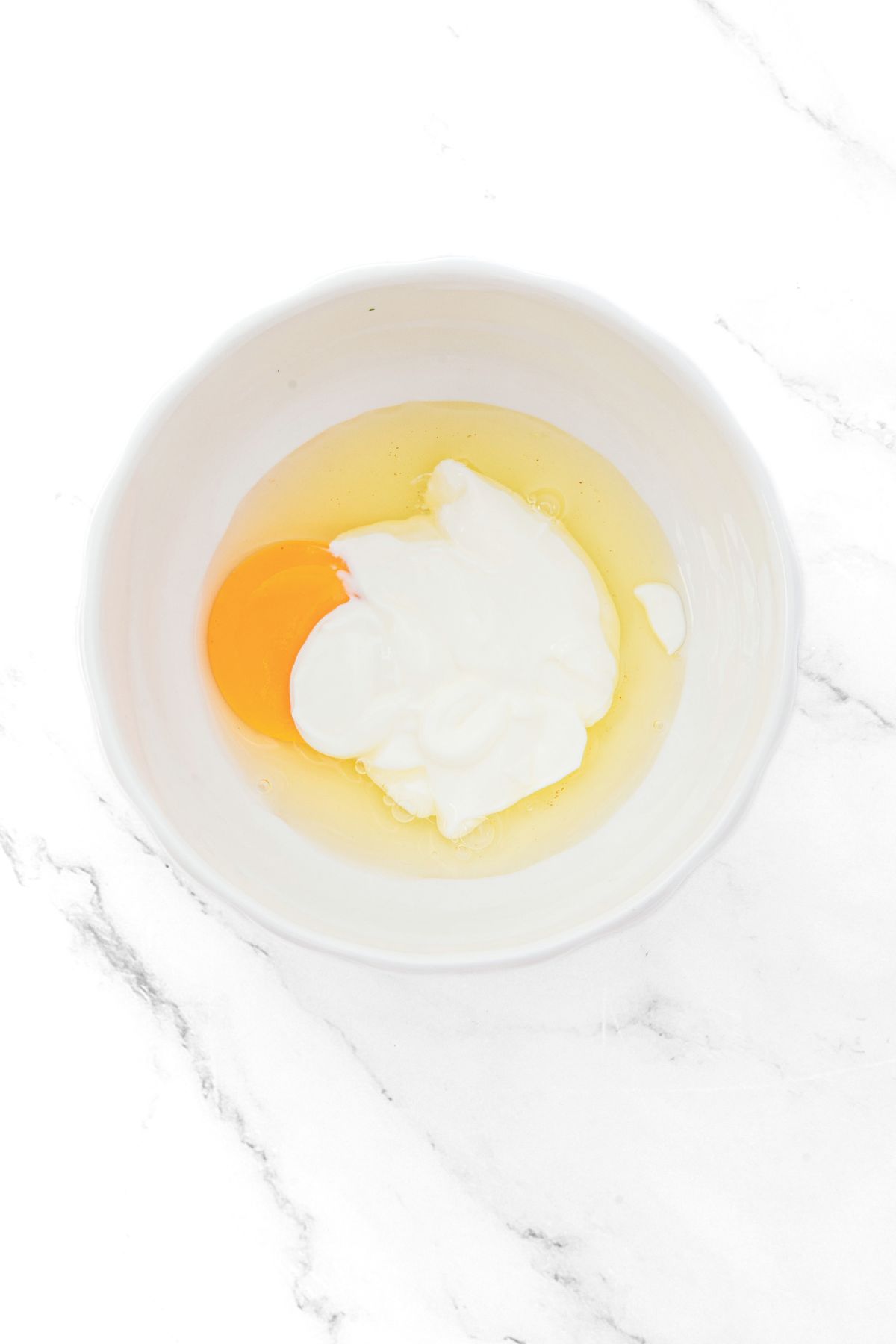 Healthy Peach Cobbler (Gluten-Free, Low-Carb) A bowl with yogurt and egg.