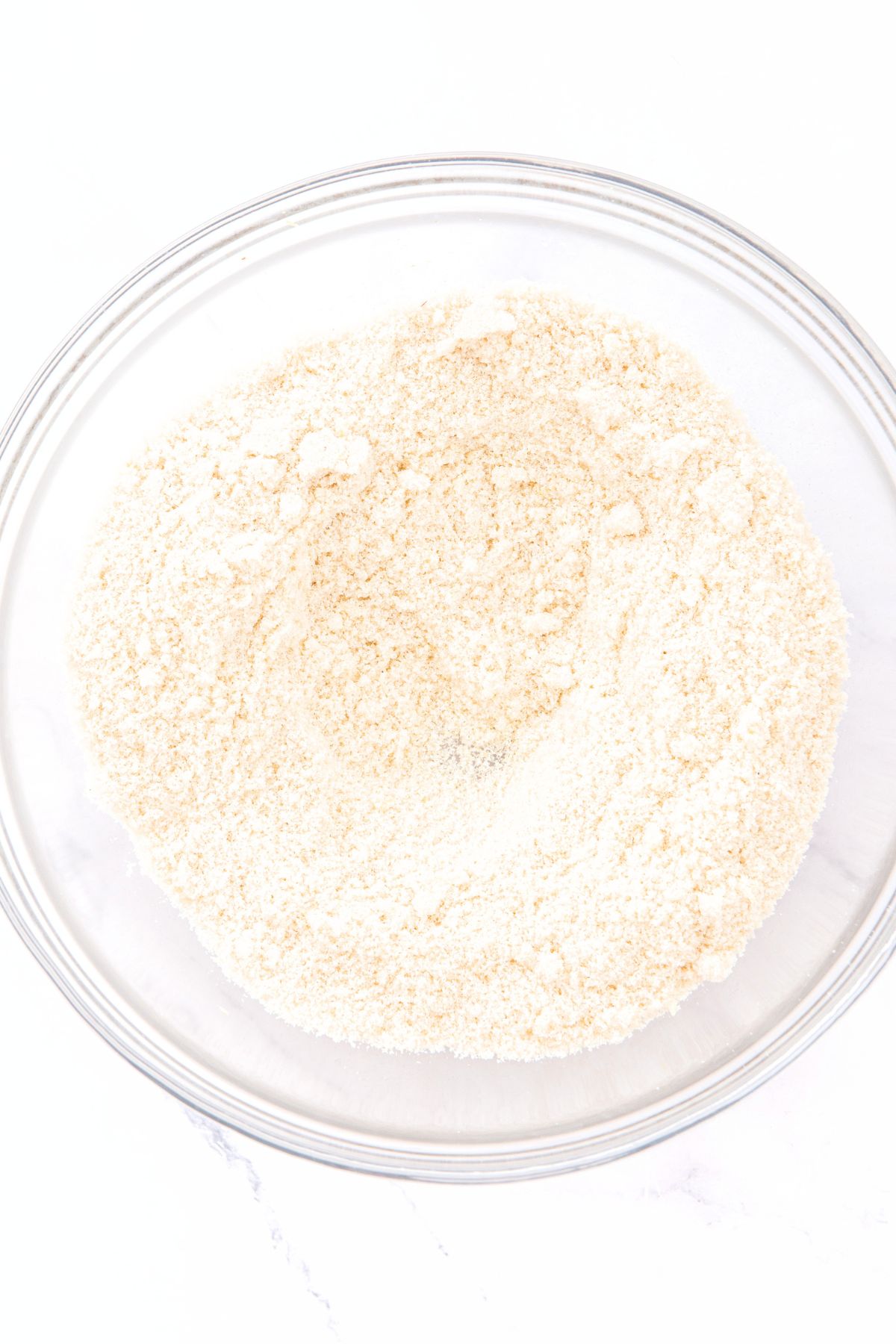Peach Cobbler Almond Flour (Gluten-Free, Dairy-Free) A mixing bowl with almond flour mixture