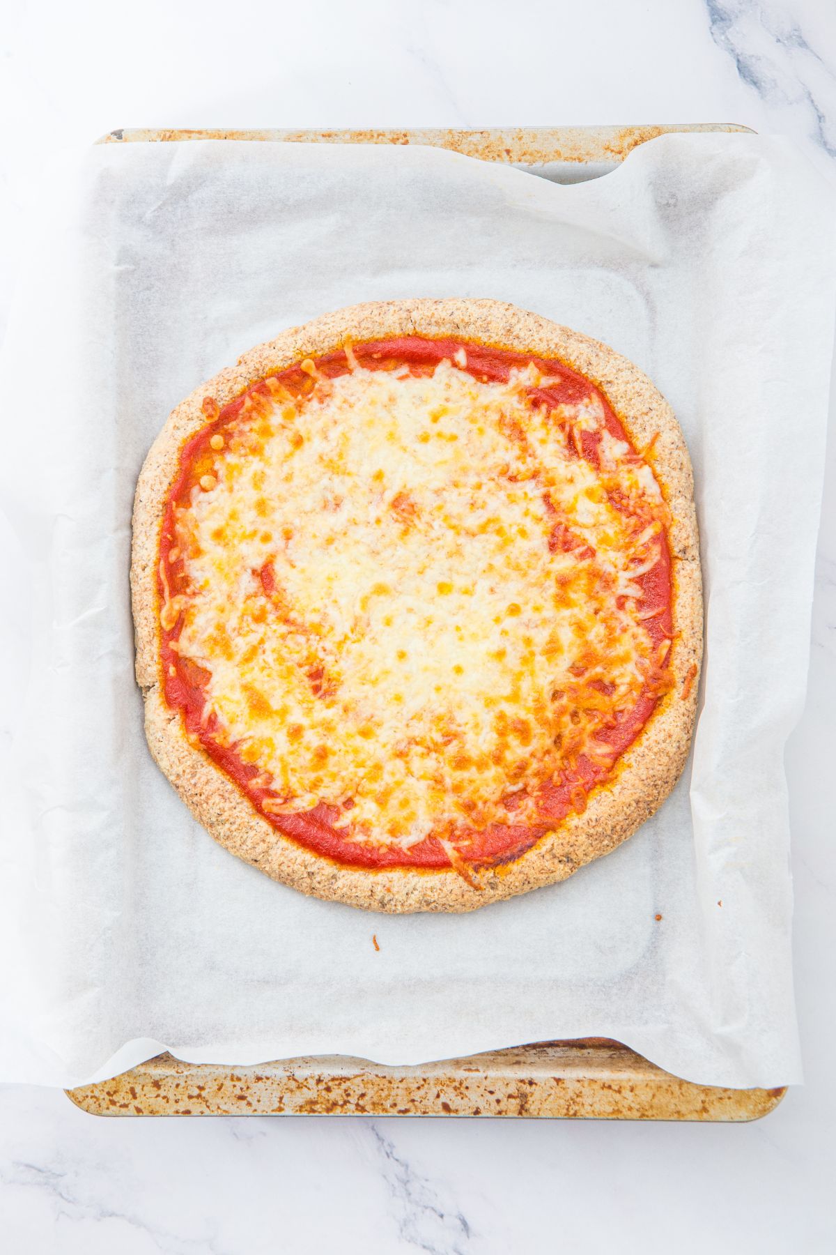 Pizza with tomato sauce and mozzarella cheese