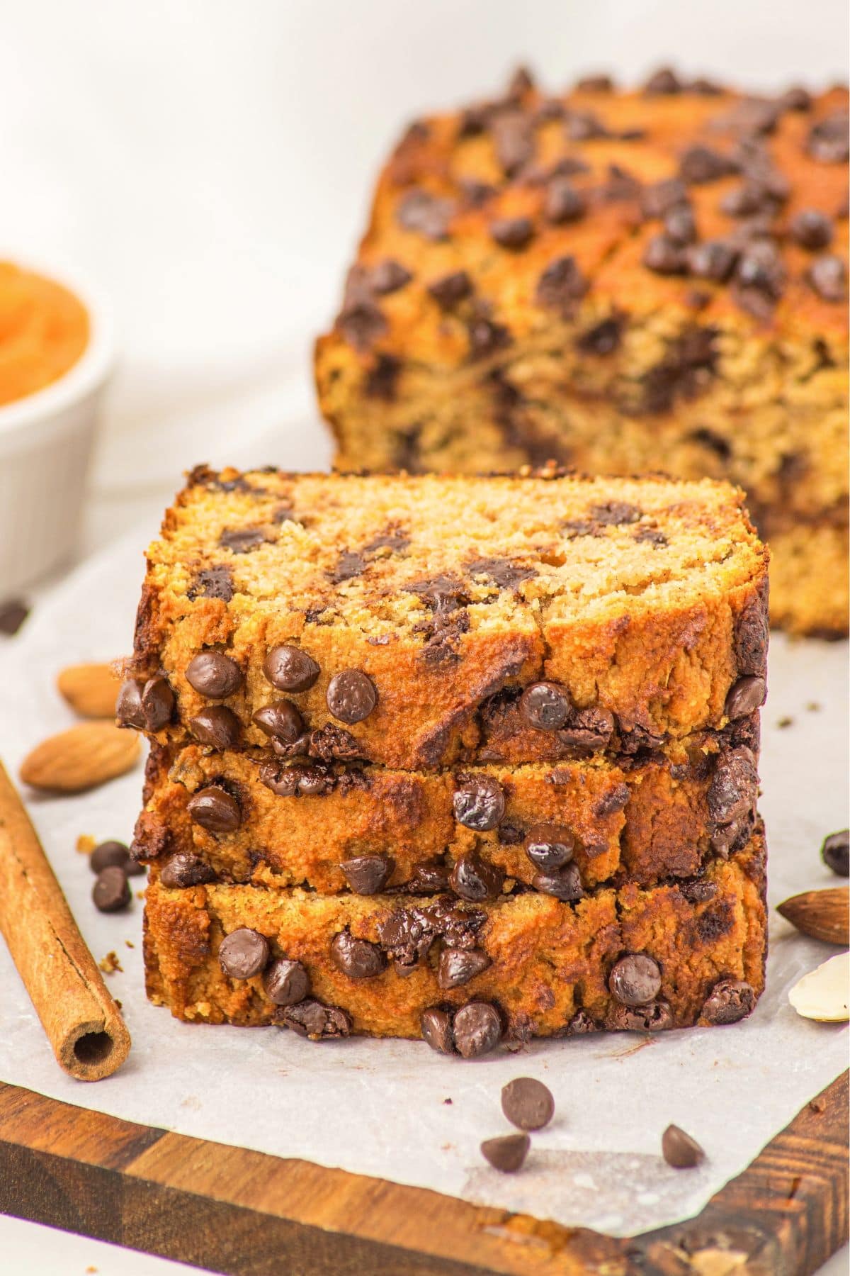 A stack of almond flour chocolate chip pumpkin bread slices.