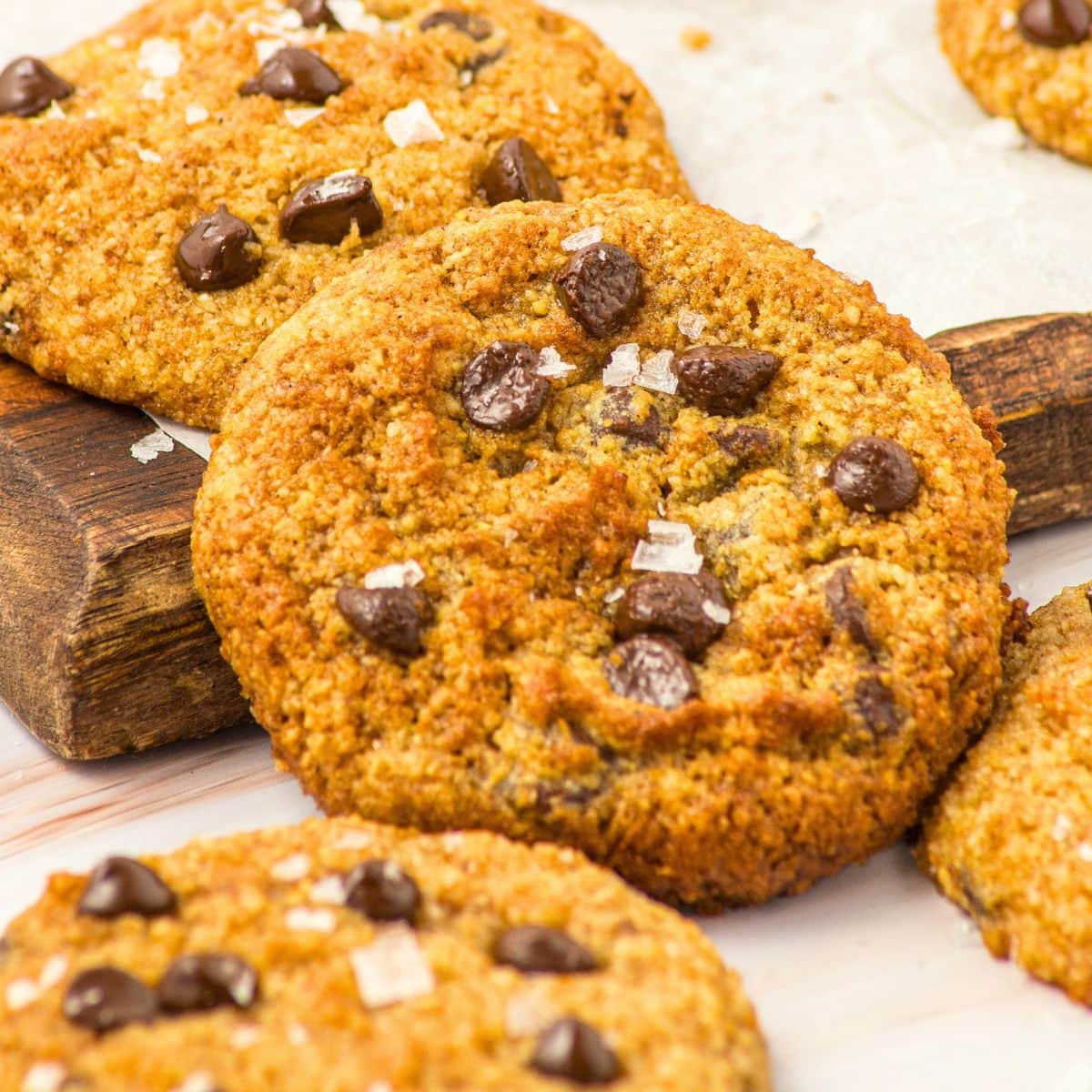 Almond flour pumpkin cookies on wooden board
