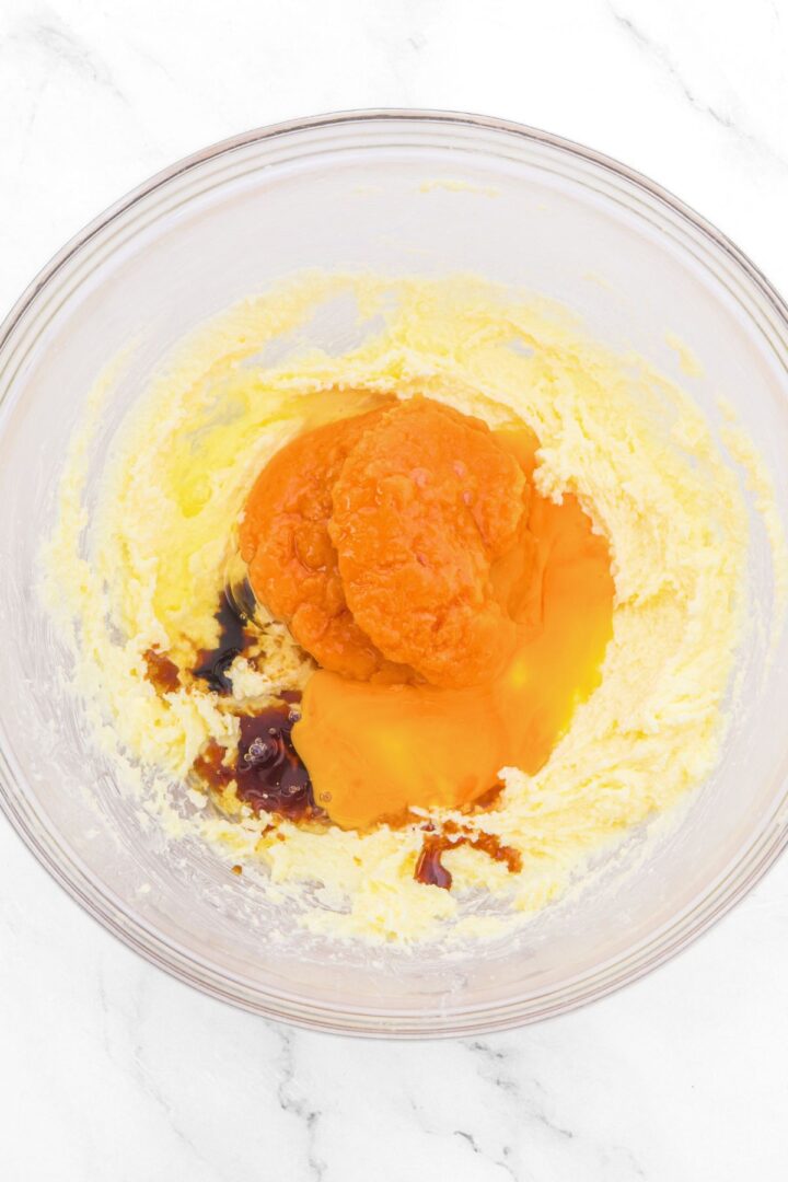 Pumpkin puree, beaten eggs, vanilla extract on top of creamed butter with eggs.