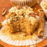 Half-eaten almond flour pumpkin muffin