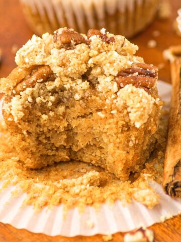 Half-eaten almond flour pumpkin muffin