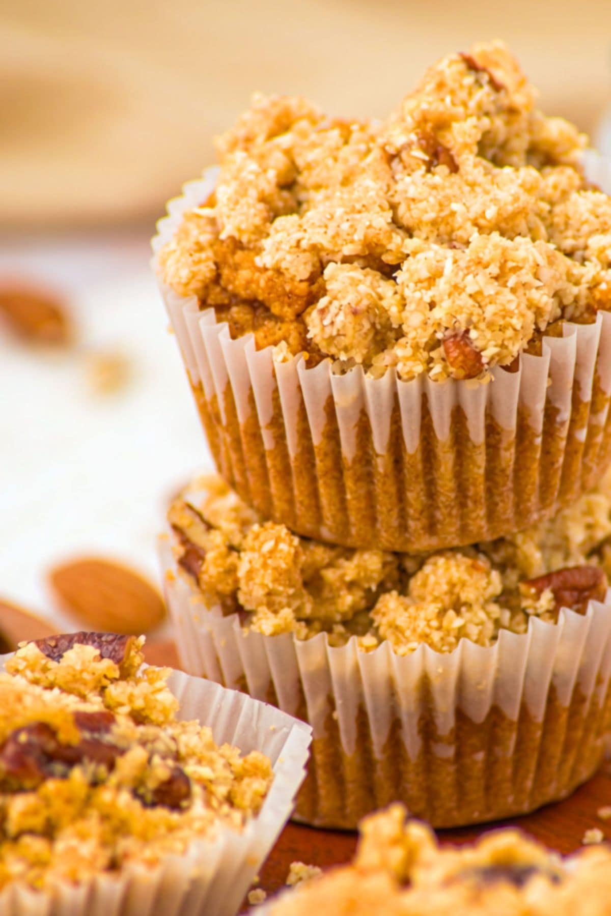 A stack of gluten-free pumpkin muffins with almond flour