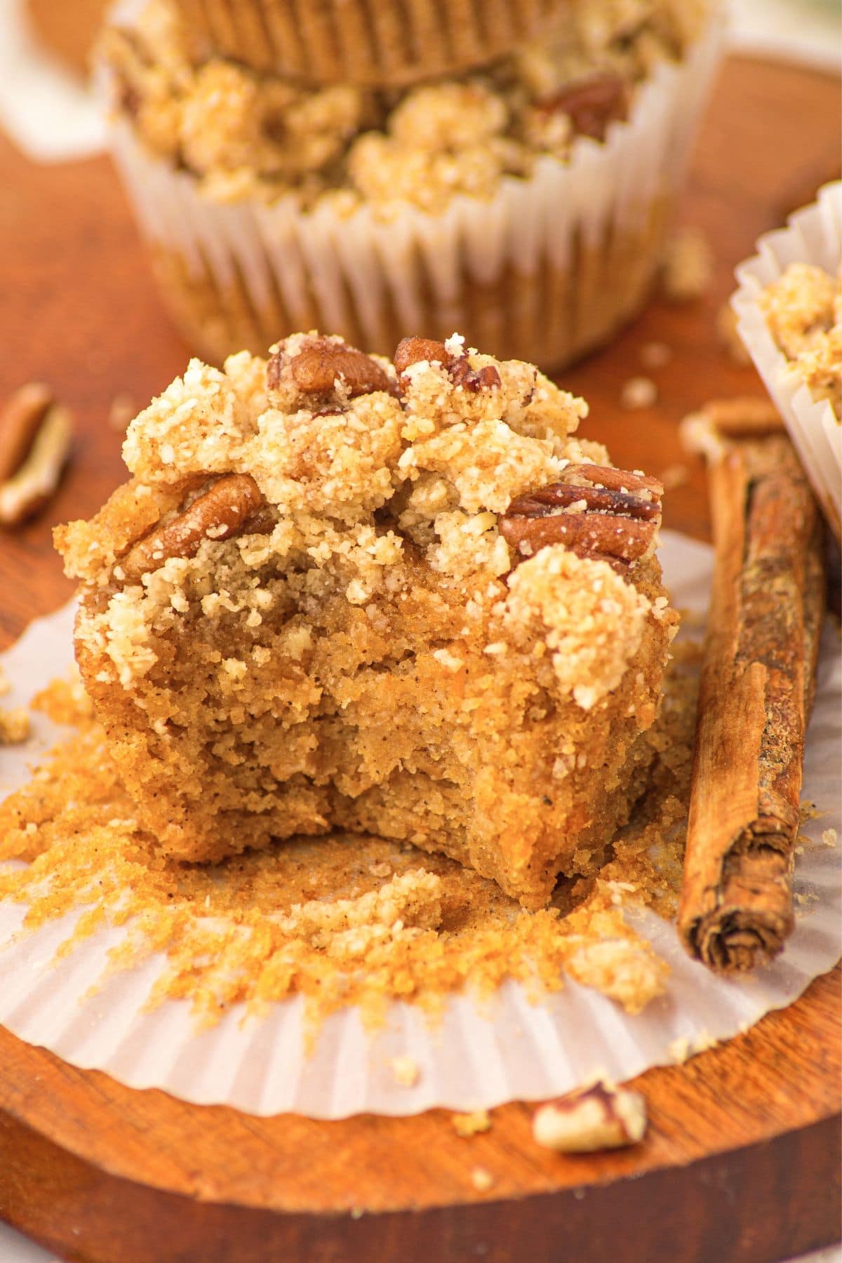 Half-eaten pumpkin almond flour muffin