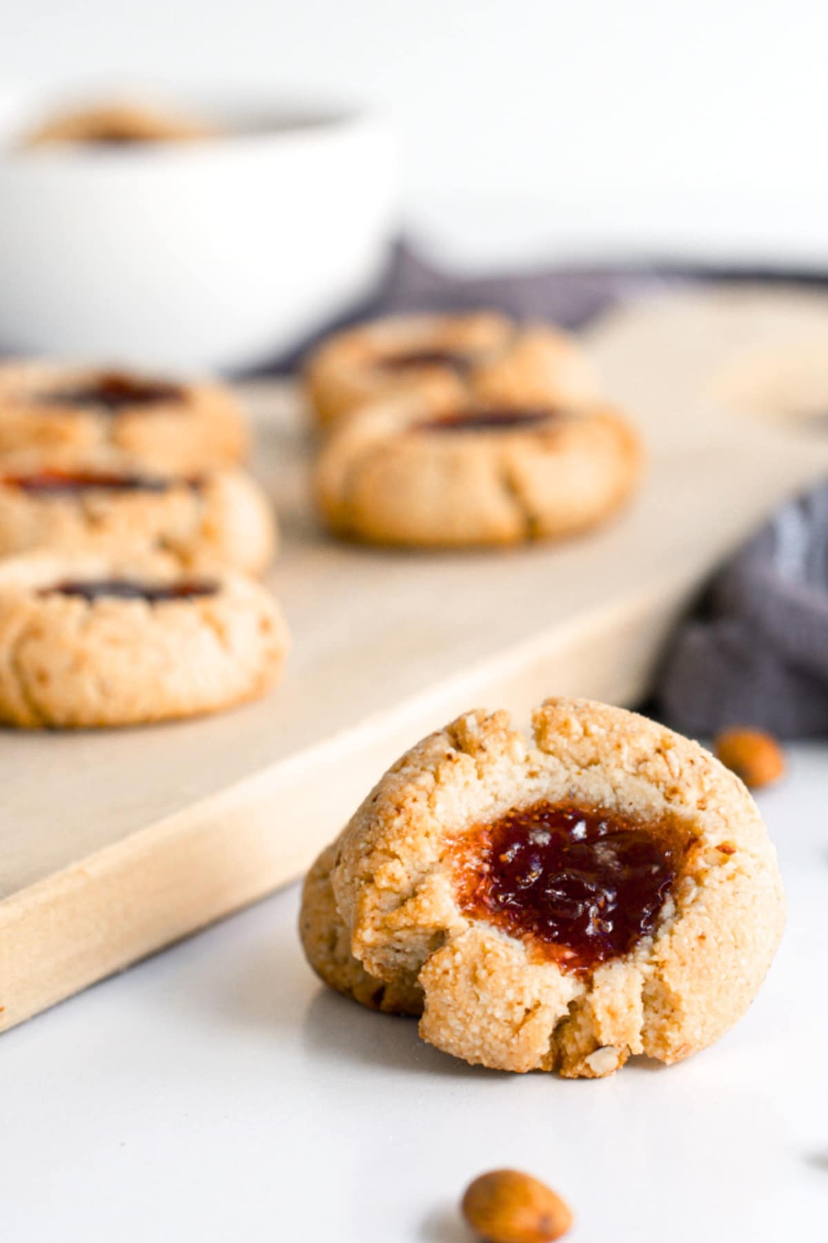 Up close shot of thumbprint cookies made with almond flour.