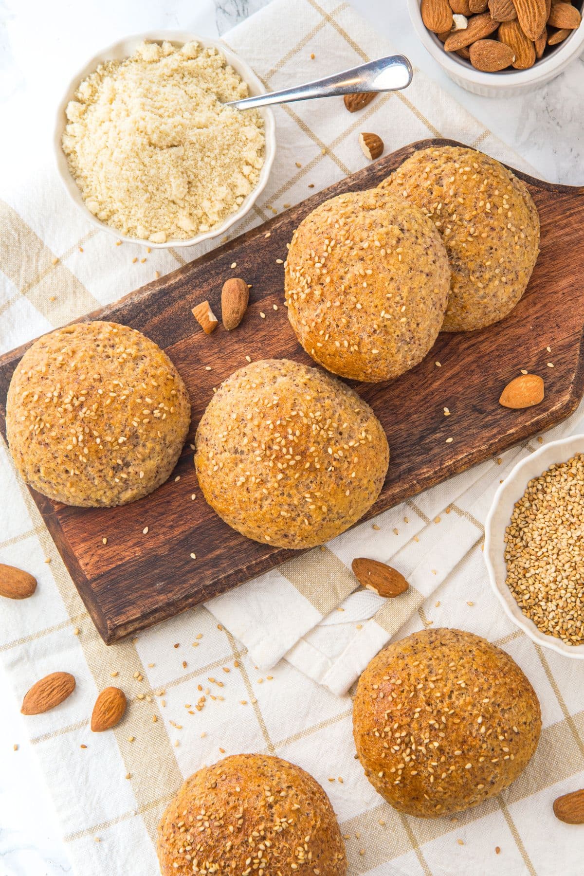 Almond flour bread rolls on wooden board