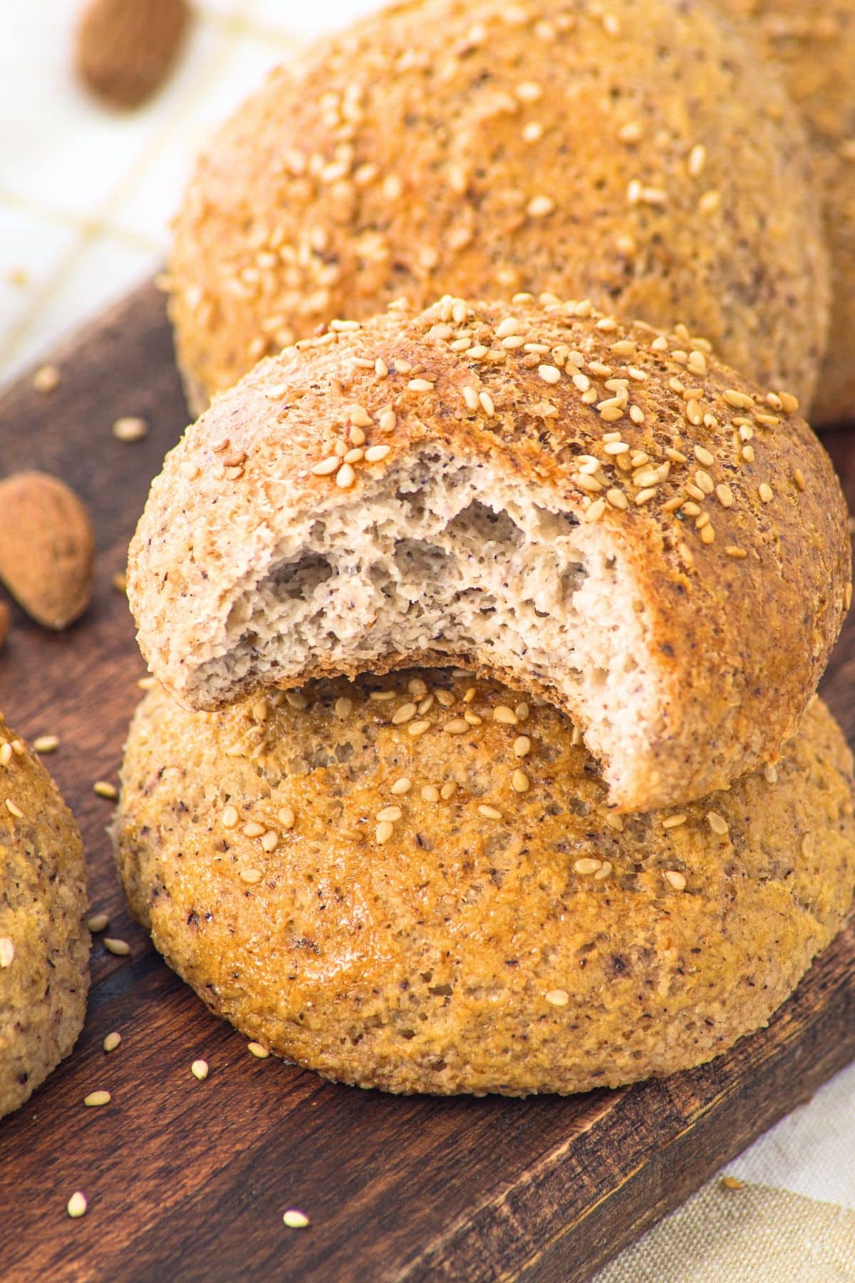 A half-eaten stack of almond flour dinner rolls
