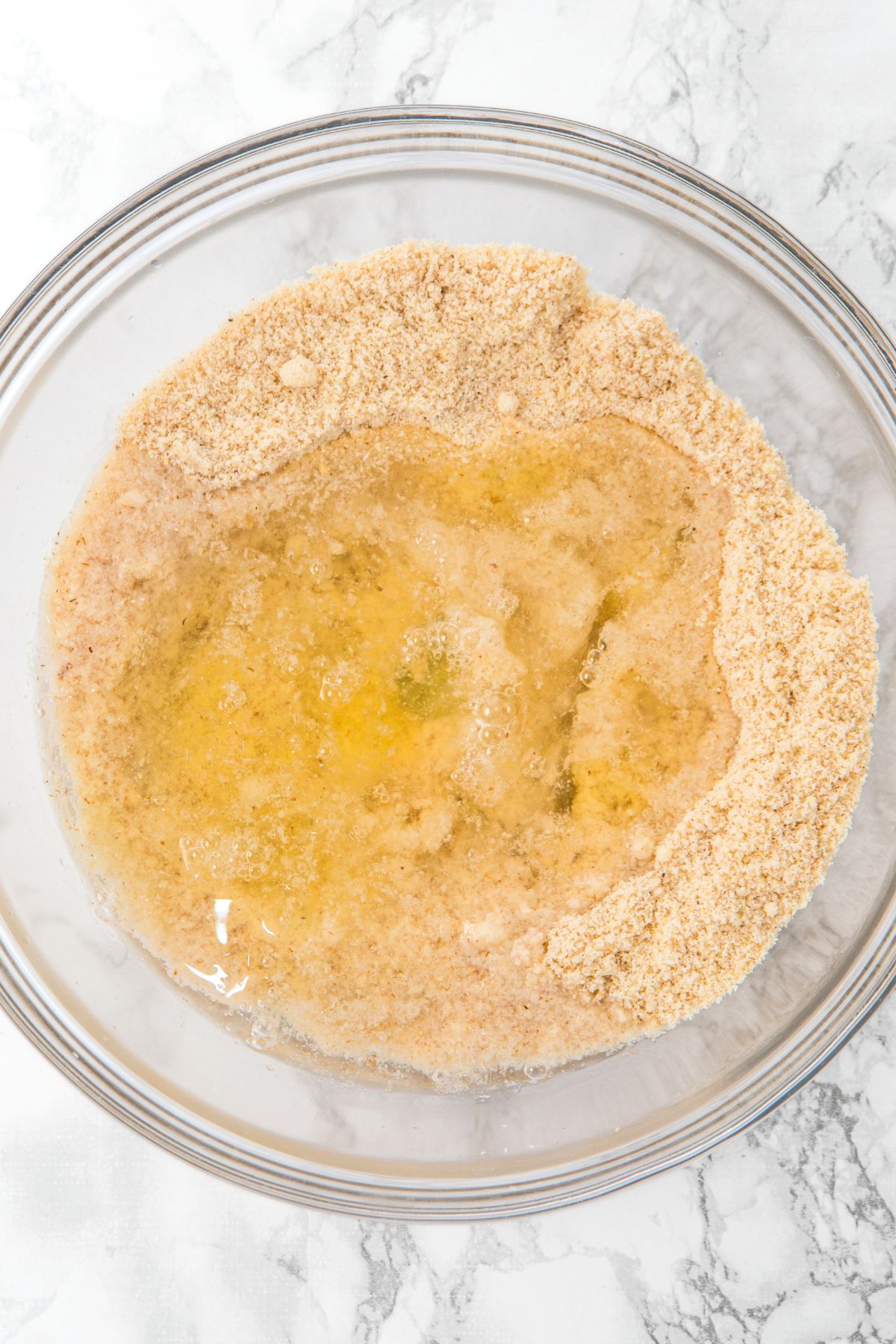 Beaten egg mixture on top of almond flour