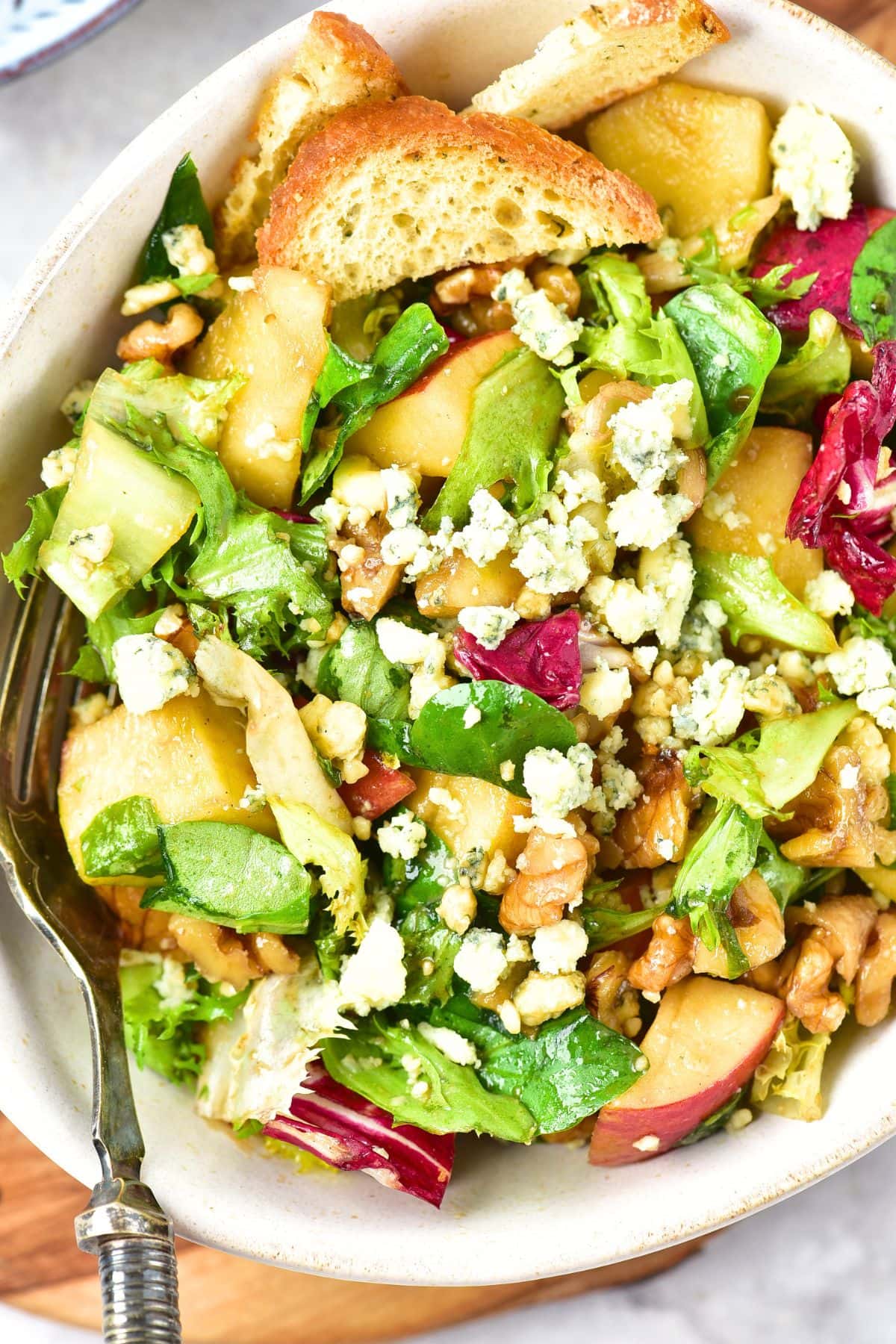 Up close view of apple blue cheese salad