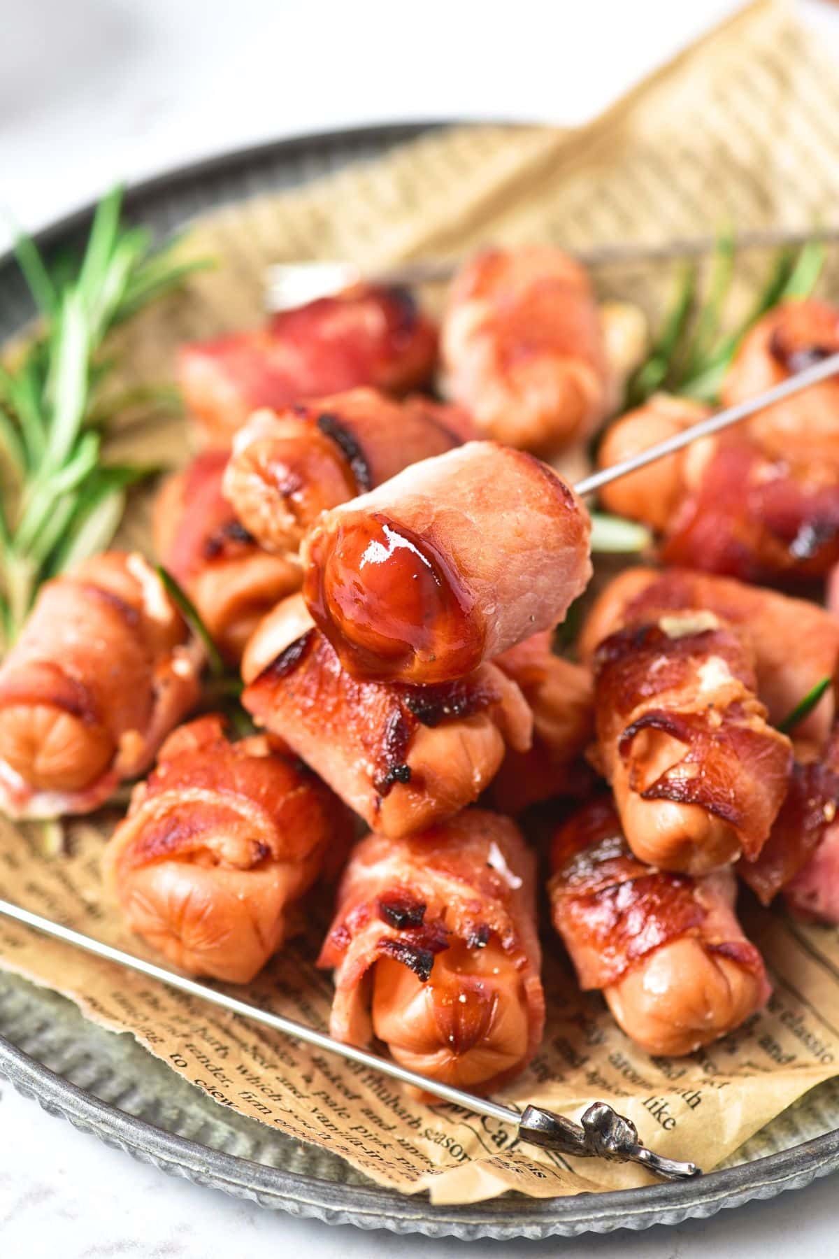 Up close view of bacon-wrapped sausages