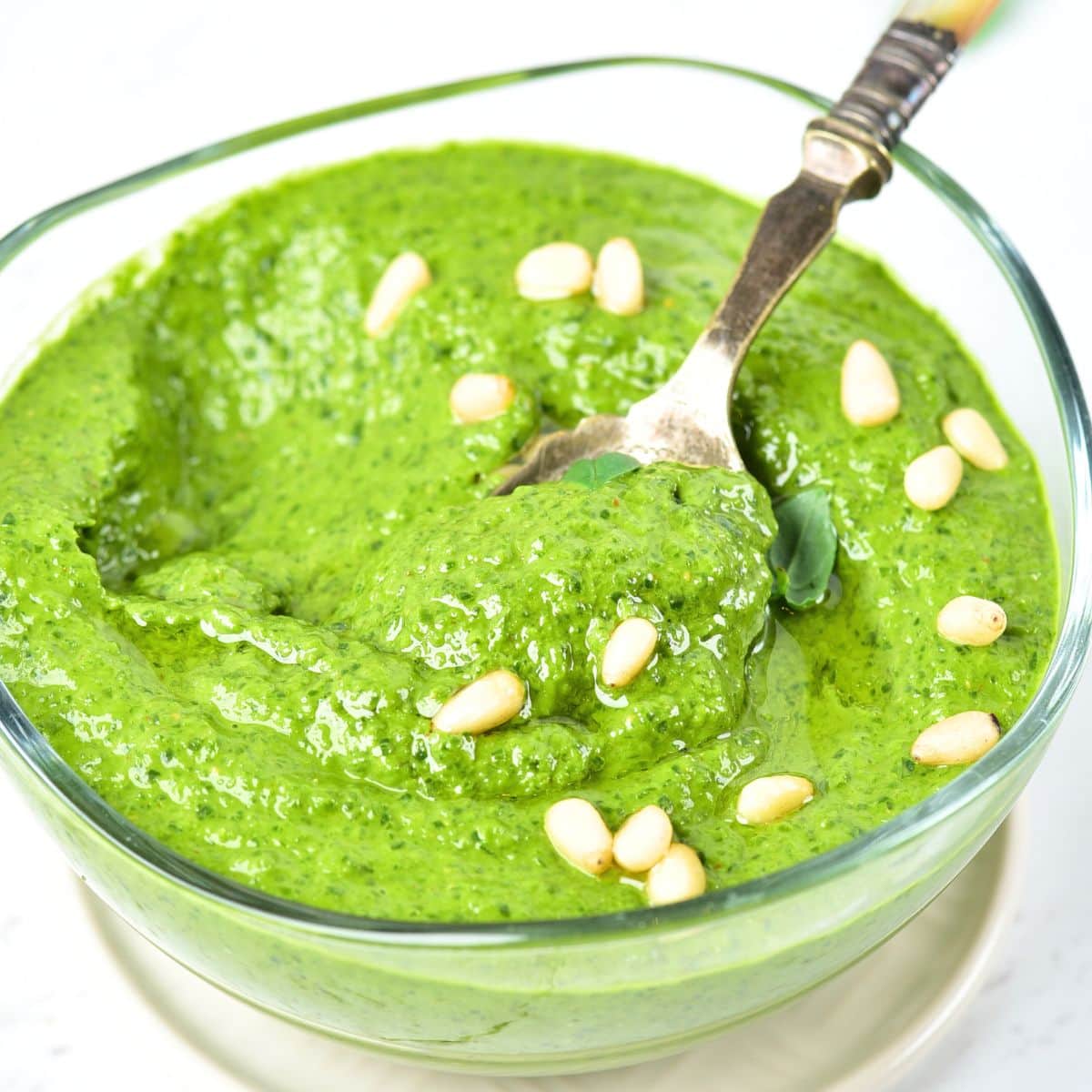 A bowl of basil pesto dressing