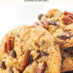 Up close view of a stack of pecan chocolate chip cookies