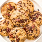A plate of pecan chocolate chip cookies