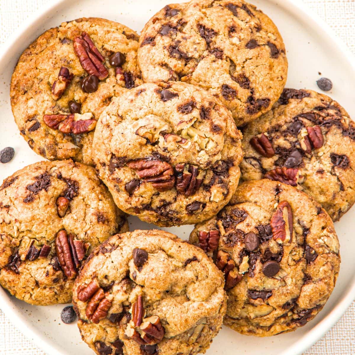 A plate of pecan chocolate chip cookies