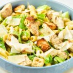 A bowl of chicken caesar pasta salad