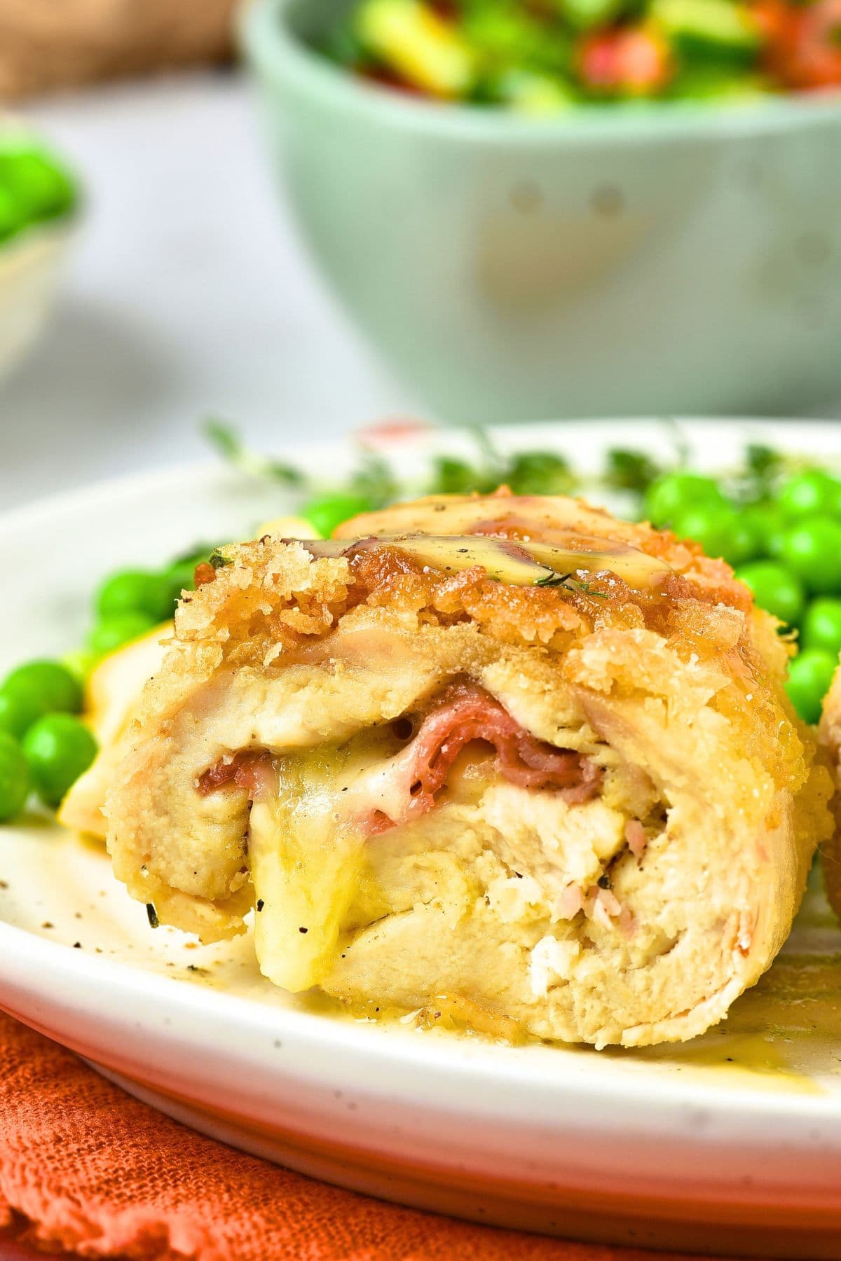 Chicken Cordon Bleu Recipe (Gluten-Free) Up close view of sliced piece of chicken cordon bleu