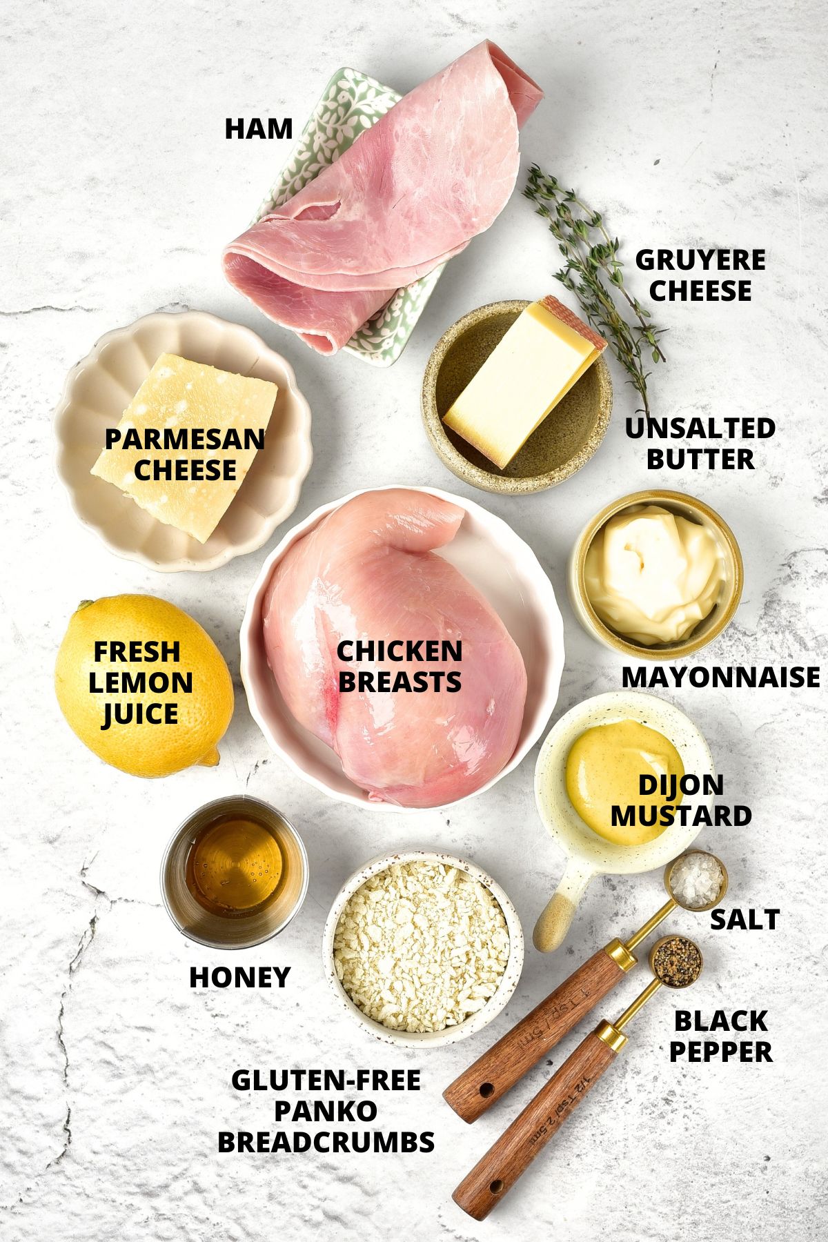 Chicken Cordon Bleu Recipe (Gluten-Free) Ingredients for chicken cordon bleu recipe laid out on marble board.
