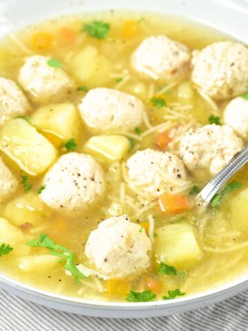 A bowl of chicken meatball soup