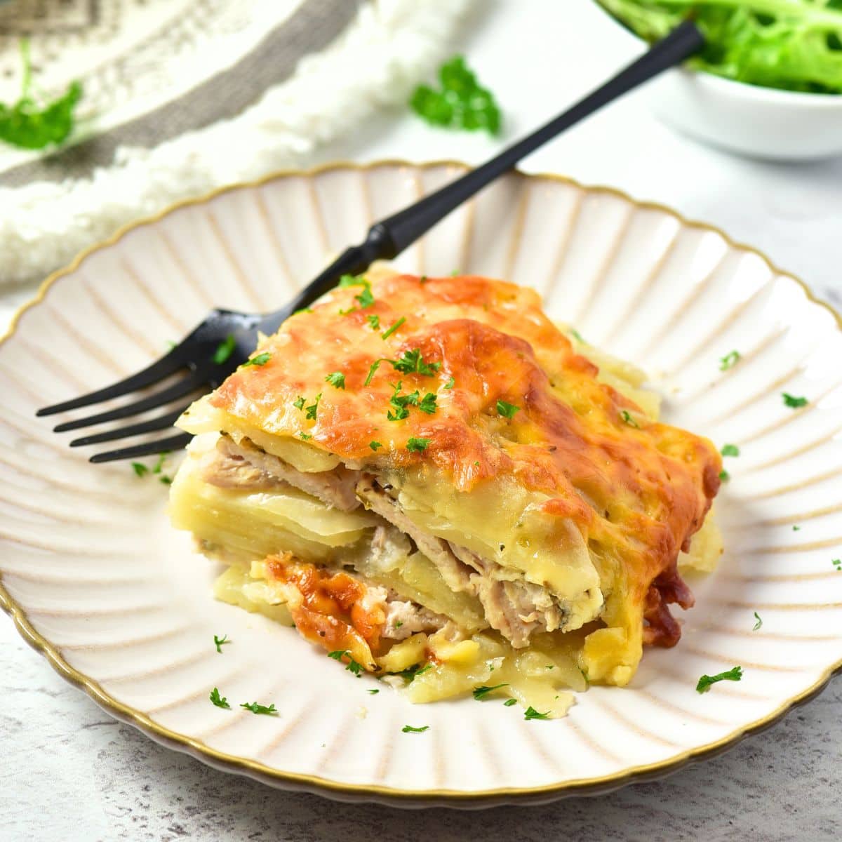 A plate with a portion of chicken casserole bake