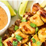 Gluten-free chicken satay with peanut sauce.