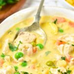 Spoon in a bowl of gluten-free dairy-free creamy chicken soup