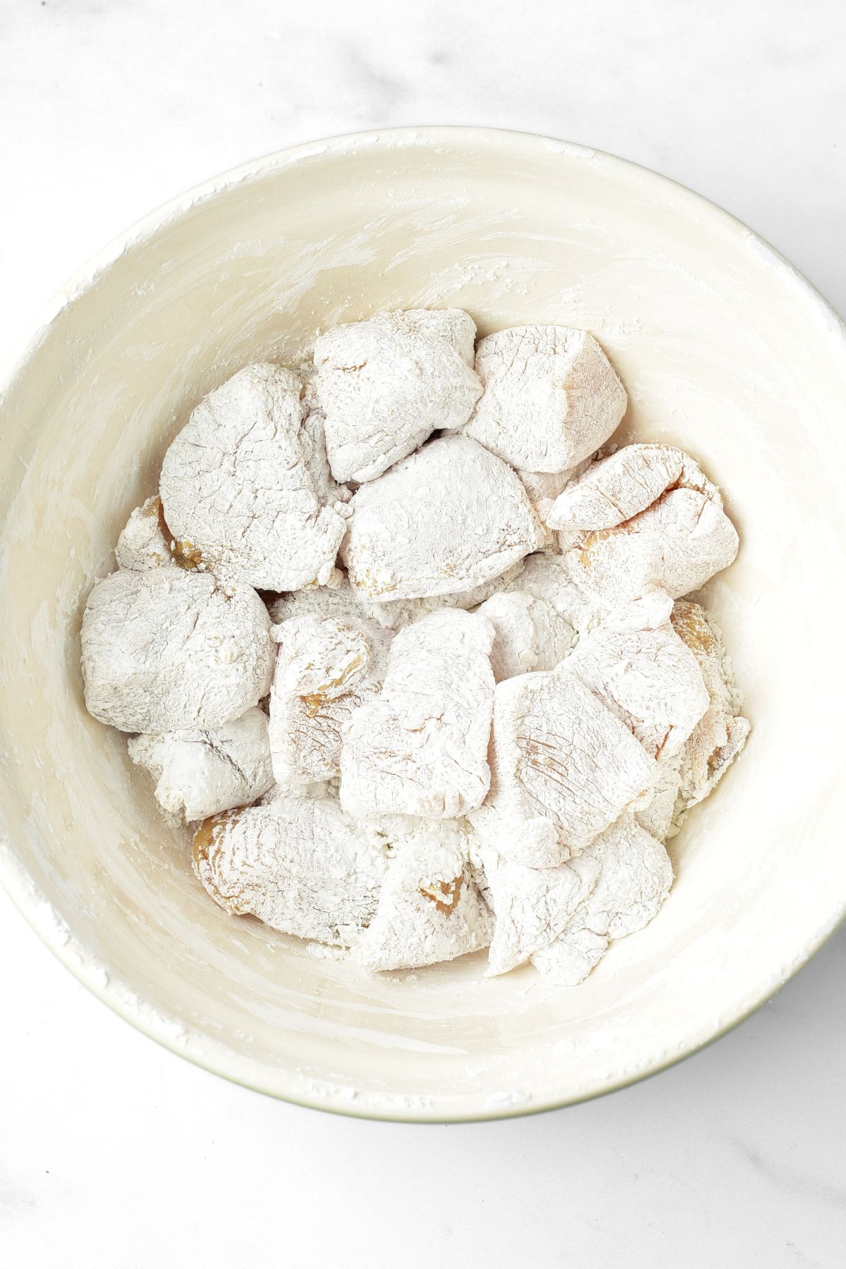 Chicken pieces coated in cornstarch