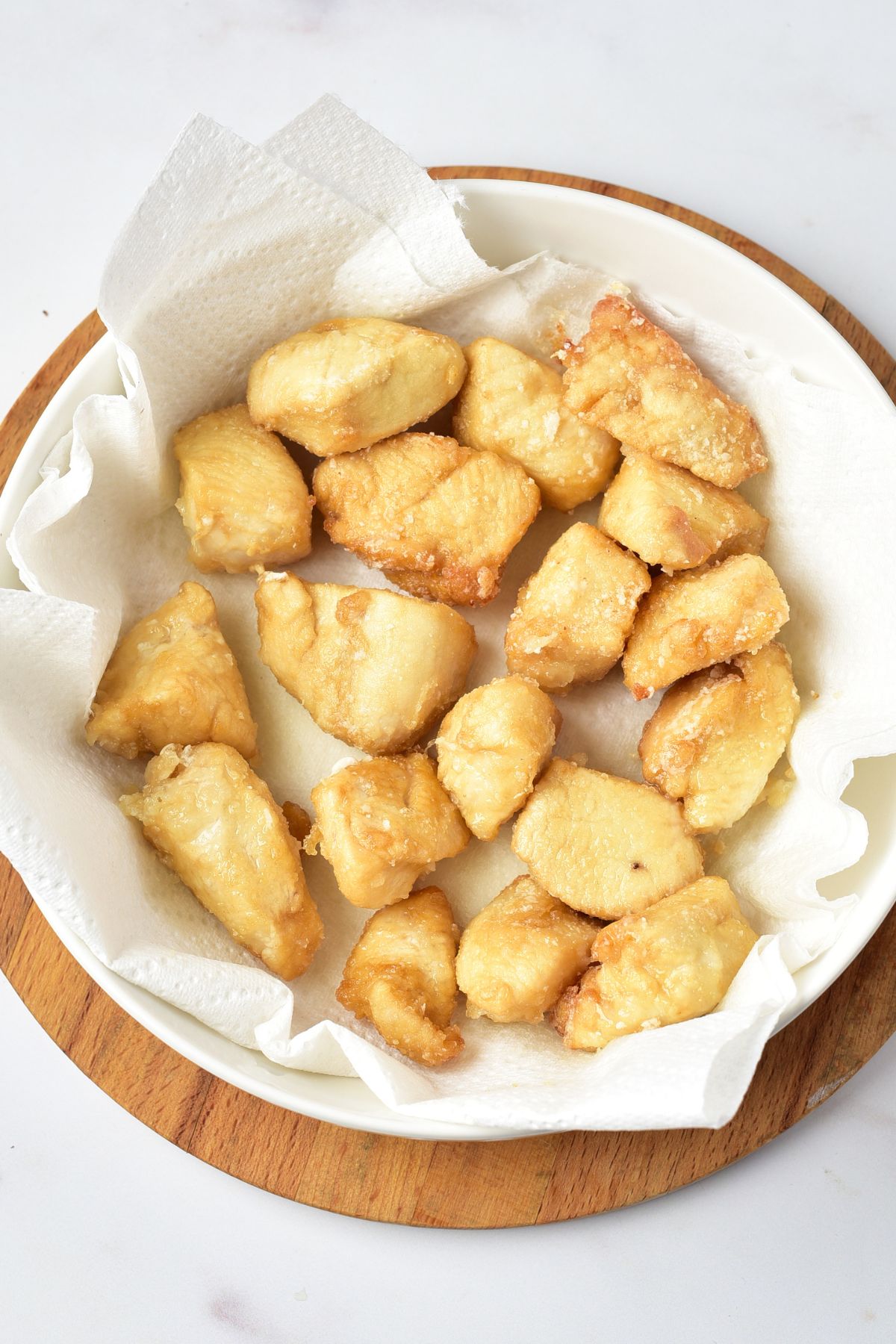 Fried chicken pieces on paper towel